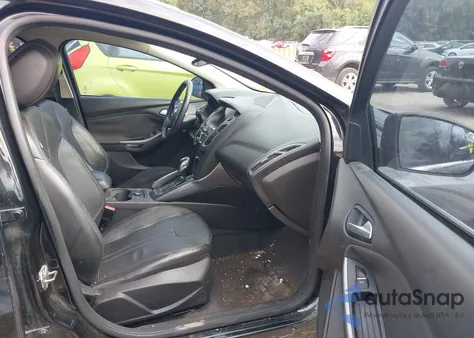 2013 Ford Focus Titanium z USA, uszkodzony, nr VIN 1FADP3J23DL169468